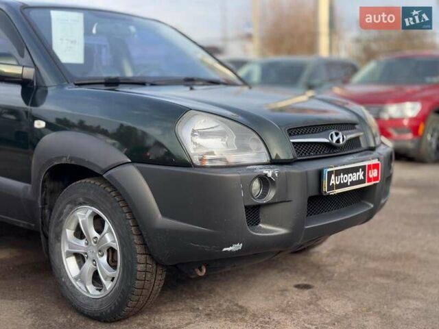 Зеленый Хендай Туксон, объемом двигателя 2 л и пробегом 132 тыс. км за 7490 $, фото 4 на Automoto.ua