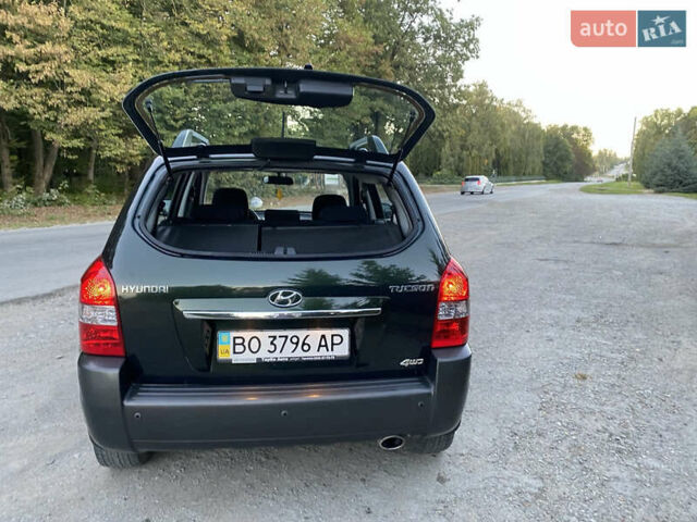 Зелений Хендай Туксон, об'ємом двигуна 2 л та пробігом 110 тис. км за 9200 $, фото 10 на Automoto.ua