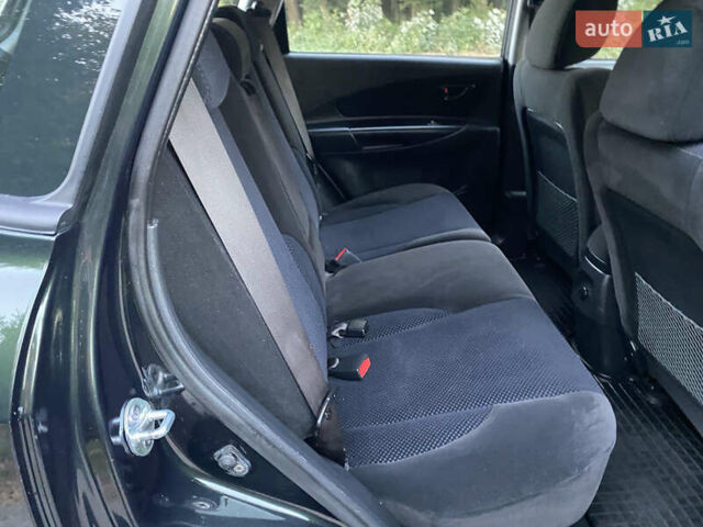 Зелений Хендай Туксон, об'ємом двигуна 2 л та пробігом 110 тис. км за 9200 $, фото 22 на Automoto.ua