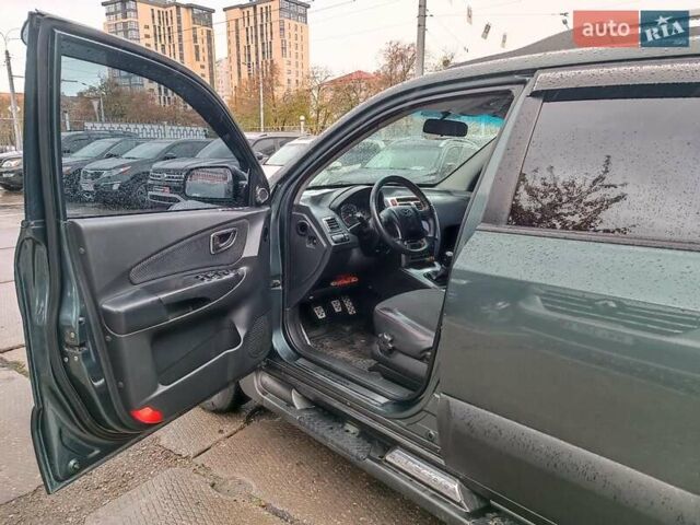 Зеленый Хендай Туксон, объемом двигателя 2 л и пробегом 146 тыс. км за 10990 $, фото 17 на Automoto.ua