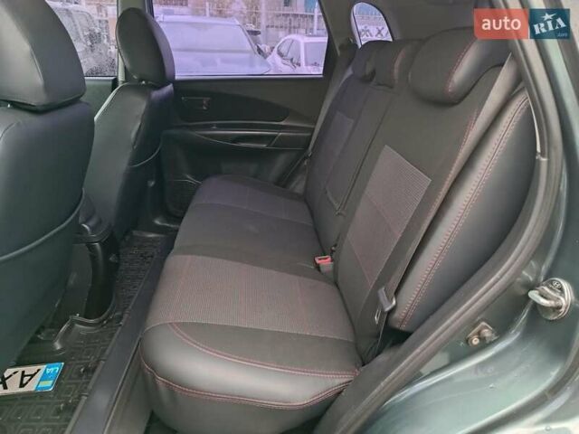 Зеленый Хендай Туксон, объемом двигателя 2 л и пробегом 146 тыс. км за 9890 $, фото 11 на Automoto.ua