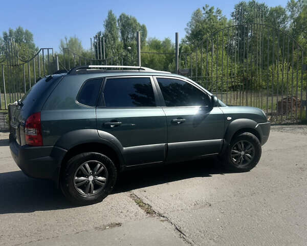 Зеленый Хендай Туксон, объемом двигателя 2 л и пробегом 144 тыс. км за 10800 $, фото 40 на Automoto.ua