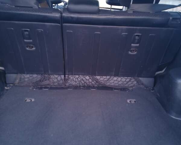 Зеленый Хендай Туксон, объемом двигателя 1.98 л и пробегом 146 тыс. км за 10000 $, фото 7 на Automoto.ua