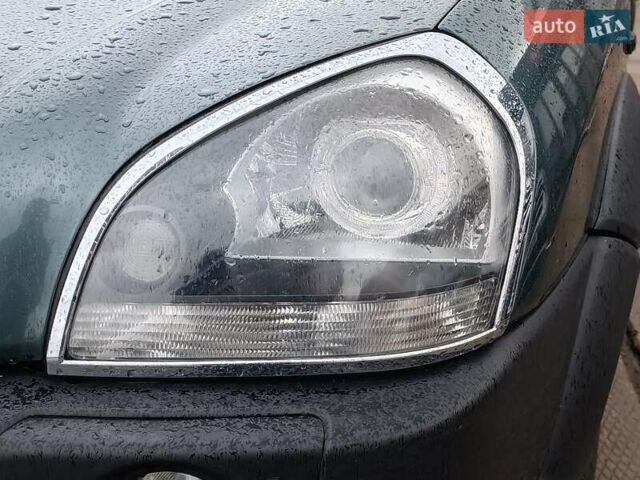 Зеленый Хендай Туксон, объемом двигателя 2 л и пробегом 146 тыс. км за 9890 $, фото 2 на Automoto.ua