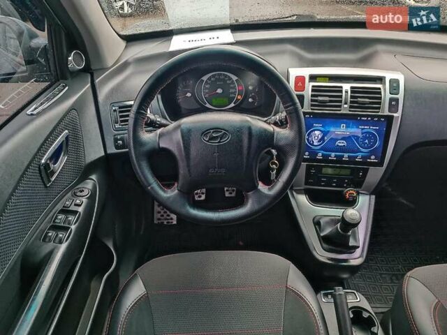 Зеленый Хендай Туксон, объемом двигателя 2 л и пробегом 146 тыс. км за 9890 $, фото 13 на Automoto.ua