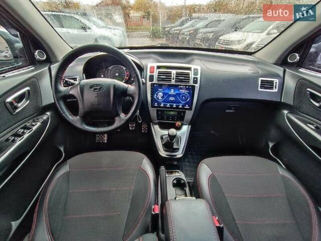 Зеленый Хендай Туксон, объемом двигателя 2 л и пробегом 146 тыс. км за 9890 $, фото 12 на Automoto.ua