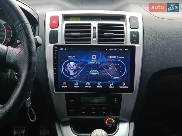 Зеленый Хендай Туксон, объемом двигателя 2 л и пробегом 146 тыс. км за 9890 $, фото 14 на Automoto.ua