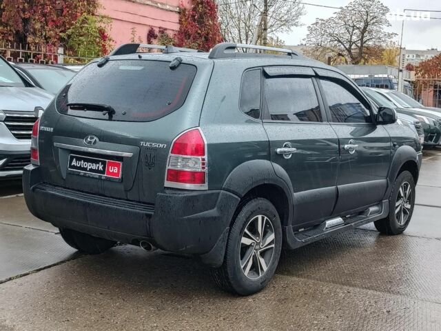 Хендай Туксон 2011 у Харкові на Automoto.ua Зелений Хендай Туксон, об'ємом двигуна 2 л та пробігом 146 тис. км за 10990 $, фото 6 на Automoto.ua