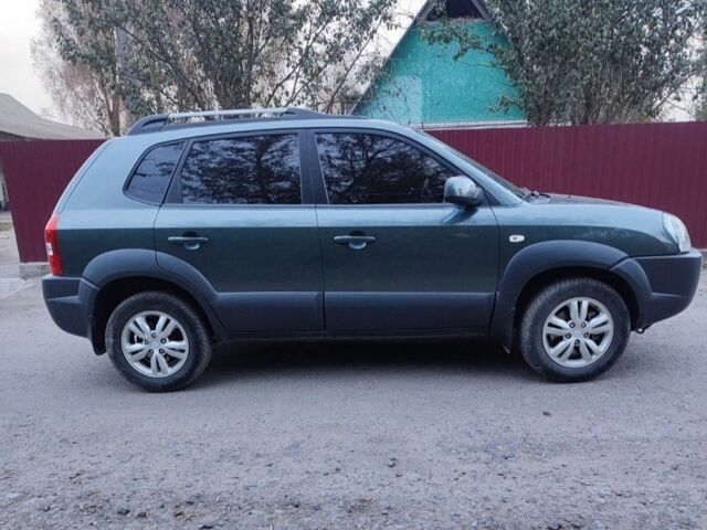 Зеленый Хендай Туксон, объемом двигателя 2 л и пробегом 97 тыс. км за 9600 $, фото 5 на Automoto.ua