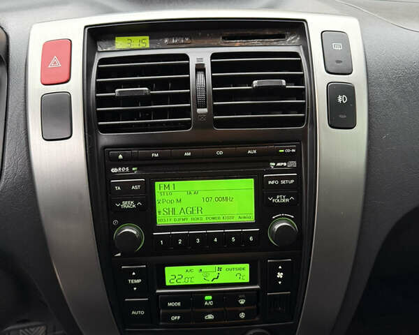 Зеленый Хендай Туксон, объемом двигателя 2 л и пробегом 65 тыс. км за 12250 $, фото 61 на Automoto.ua