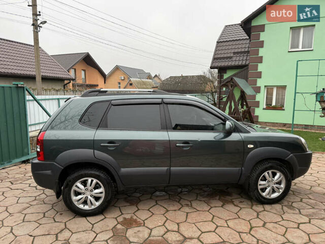 Зеленый Хендай Туксон, объемом двигателя 2 л и пробегом 65 тыс. км за 12250 $, фото 7 на Automoto.ua