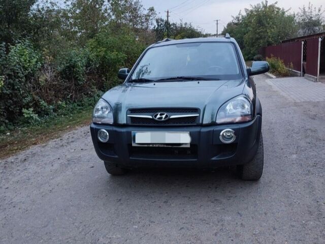 Зеленый Хендай Туксон, объемом двигателя 2 л и пробегом 97 тыс. км за 9600 $, фото 6 на Automoto.ua