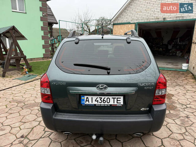 Зелений Хендай Туксон, об'ємом двигуна 2 л та пробігом 65 тис. км за 12250 $, фото 5 на Automoto.ua