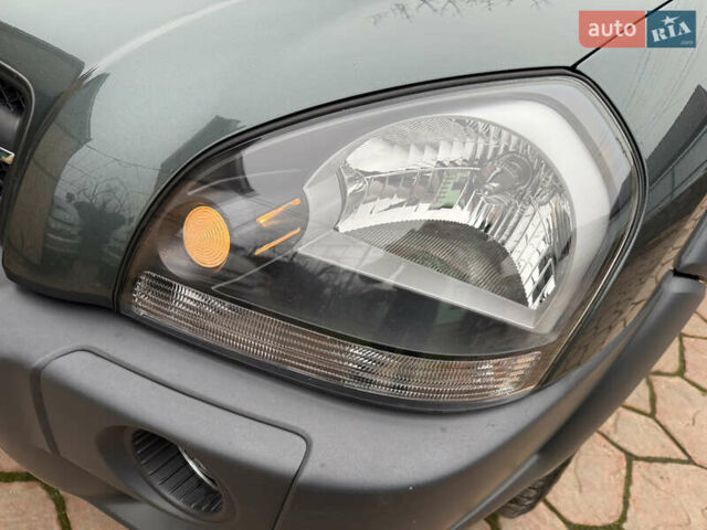 Зеленый Хендай Туксон, объемом двигателя 2 л и пробегом 65 тыс. км за 12250 $, фото 29 на Automoto.ua