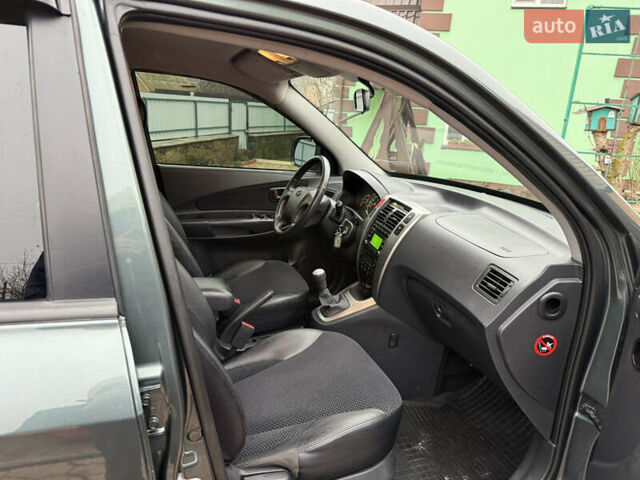 Зелений Хендай Туксон, об'ємом двигуна 2 л та пробігом 65 тис. км за 12250 $, фото 74 на Automoto.ua