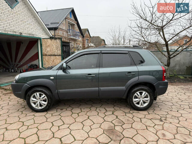 Зеленый Хендай Туксон, объемом двигателя 2 л и пробегом 65 тыс. км за 12250 $, фото 15 на Automoto.ua