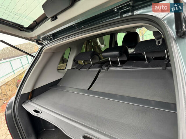 Зеленый Хендай Туксон, объемом двигателя 2 л и пробегом 65 тыс. км за 12250 $, фото 43 на Automoto.ua