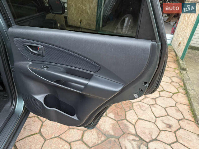 Зелений Хендай Туксон, об'ємом двигуна 2 л та пробігом 65 тис. км за 12250 $, фото 69 на Automoto.ua