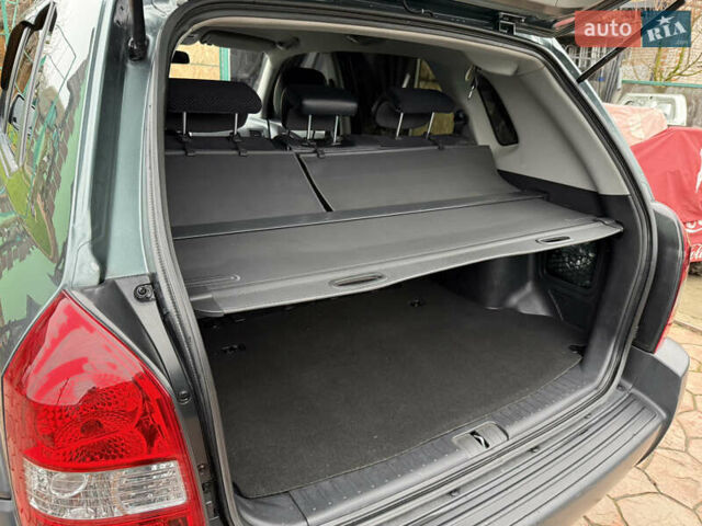 Зелений Хендай Туксон, об'ємом двигуна 2 л та пробігом 65 тис. км за 12250 $, фото 43 на Automoto.ua