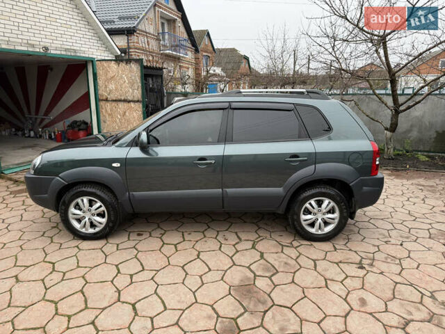 Зеленый Хендай Туксон, объемом двигателя 2 л и пробегом 65 тыс. км за 12250 $, фото 17 на Automoto.ua