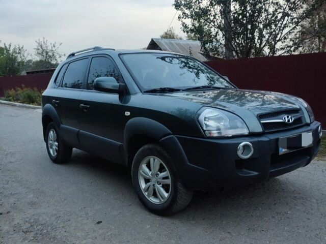 Зеленый Хендай Туксон, объемом двигателя 2 л и пробегом 97 тыс. км за 9600 $, фото 1 на Automoto.ua