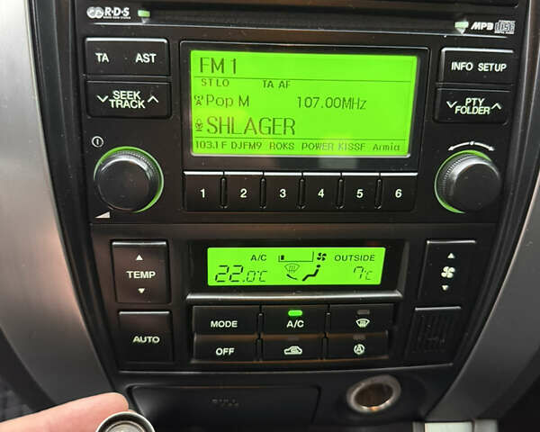 Зелений Хендай Туксон, об'ємом двигуна 2 л та пробігом 65 тис. км за 12250 $, фото 63 на Automoto.ua