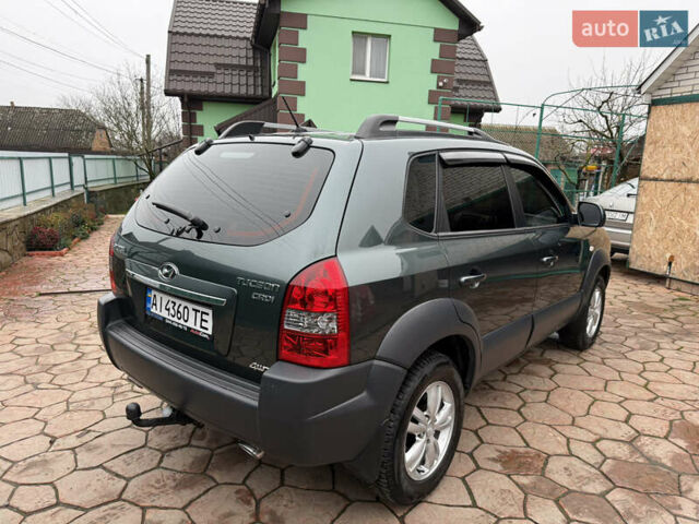 Зелений Хендай Туксон, об'ємом двигуна 2 л та пробігом 65 тис. км за 12250 $, фото 8 на Automoto.ua
