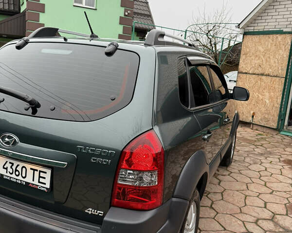 Зелений Хендай Туксон, об'ємом двигуна 2 л та пробігом 65 тис. км за 12250 $, фото 21 на Automoto.ua