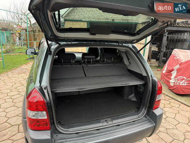 Зеленый Хендай Туксон, объемом двигателя 2 л и пробегом 65 тыс. км за 12250 $, фото 40 на Automoto.ua