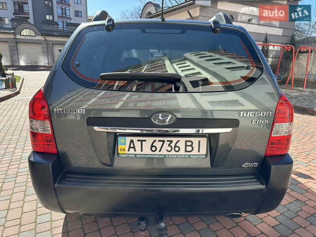 Зеленый Хендай Туксон, объемом двигателя 1.99 л и пробегом 206 тыс. км за 10850 $, фото 82 на Automoto.ua