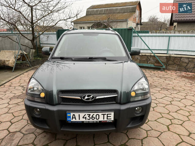 Зеленый Хендай Туксон, объемом двигателя 2 л и пробегом 65 тыс. км за 12250 $, фото 11 на Automoto.ua