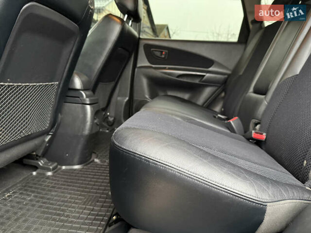 Зелений Хендай Туксон, об'ємом двигуна 2 л та пробігом 65 тис. км за 12250 $, фото 68 на Automoto.ua