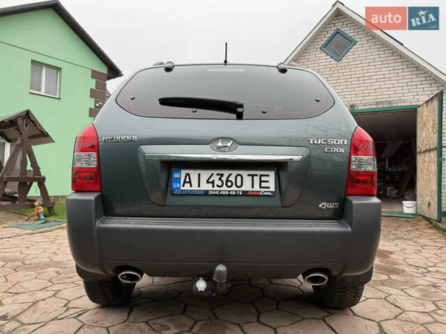 Зеленый Хендай Туксон, объемом двигателя 2 л и пробегом 65 тыс. км за 12250 $, фото 5 на Automoto.ua