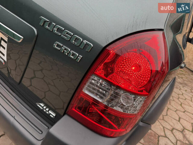 Зелений Хендай Туксон, об'ємом двигуна 2 л та пробігом 65 тис. км за 12250 $, фото 23 на Automoto.ua