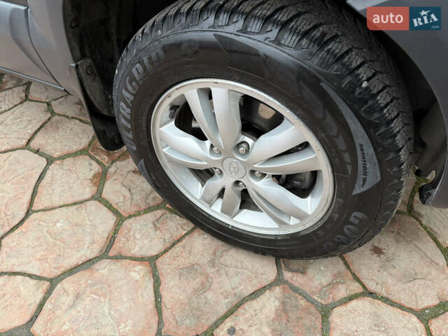 Зеленый Хендай Туксон, объемом двигателя 2 л и пробегом 65 тыс. км за 12250 $, фото 33 на Automoto.ua