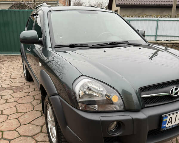 Зеленый Хендай Туксон, объемом двигателя 2 л и пробегом 65 тыс. км за 12250 $, фото 26 на Automoto.ua