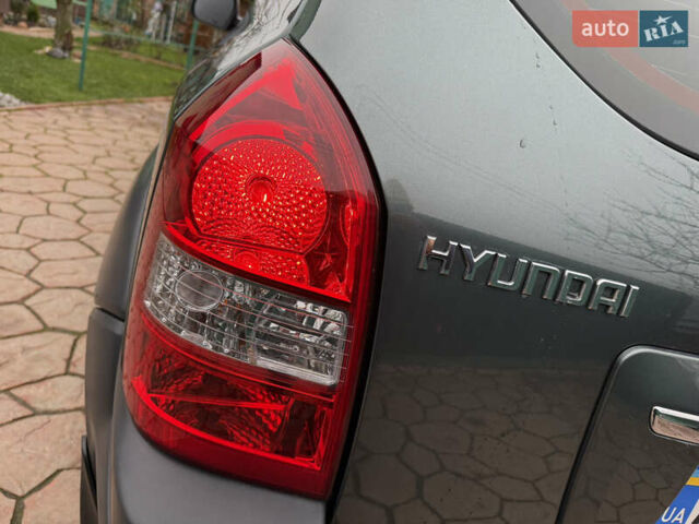 Зелений Хендай Туксон, об'ємом двигуна 2 л та пробігом 65 тис. км за 12250 $, фото 22 на Automoto.ua