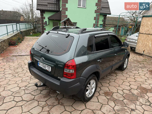 Зелений Хендай Туксон, об'ємом двигуна 2 л та пробігом 65 тис. км за 12250 $, фото 10 на Automoto.ua