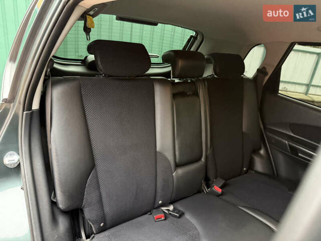 Зелений Хендай Туксон, об'ємом двигуна 2 л та пробігом 65 тис. км за 12250 $, фото 72 на Automoto.ua