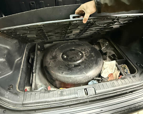Зеленый Хендай Туксон, объемом двигателя 1.98 л и пробегом 160 тыс. км за 8500 $, фото 7 на Automoto.ua