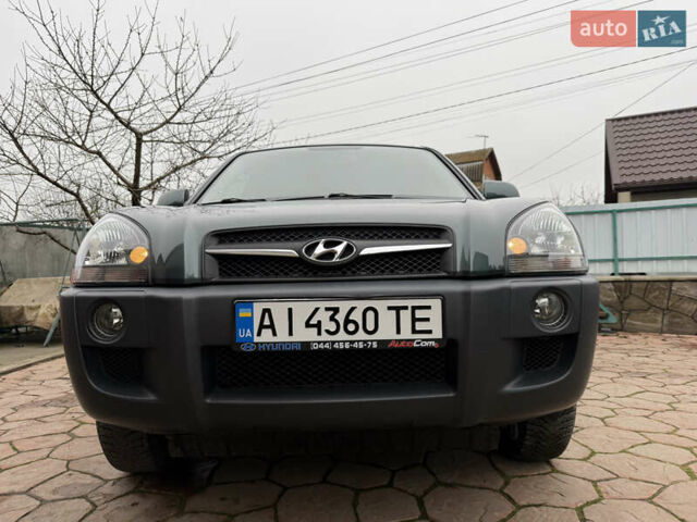 Зелений Хендай Туксон, об'ємом двигуна 2 л та пробігом 65 тис. км за 12250 $, фото 12 на Automoto.ua