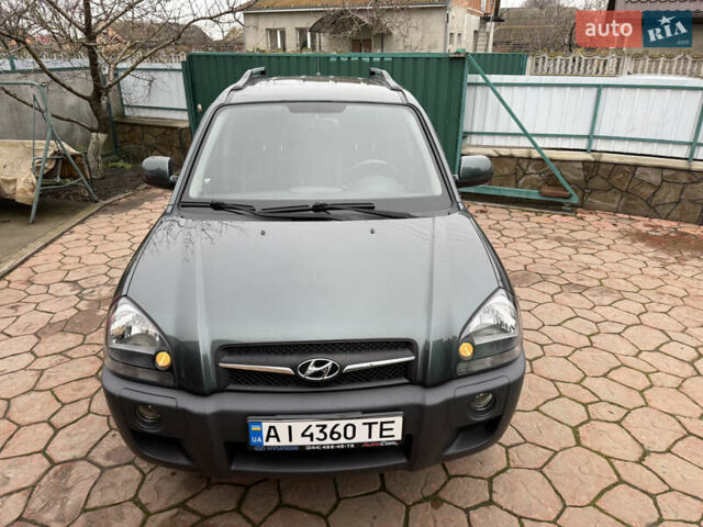 Зеленый Хендай Туксон, объемом двигателя 2 л и пробегом 65 тыс. км за 12250 $, фото 13 на Automoto.ua