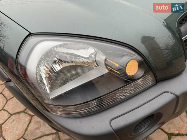 Зеленый Хендай Туксон, объемом двигателя 2 л и пробегом 65 тыс. км за 12250 $, фото 27 на Automoto.ua