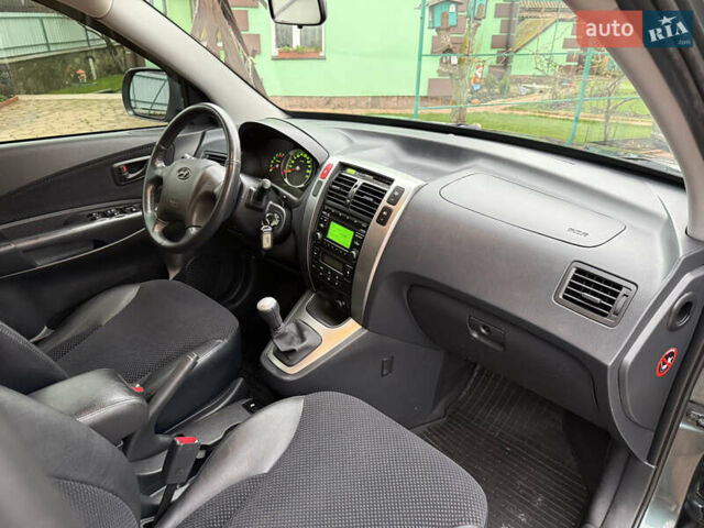 Зеленый Хендай Туксон, объемом двигателя 2 л и пробегом 65 тыс. км за 12250 $, фото 77 на Automoto.ua