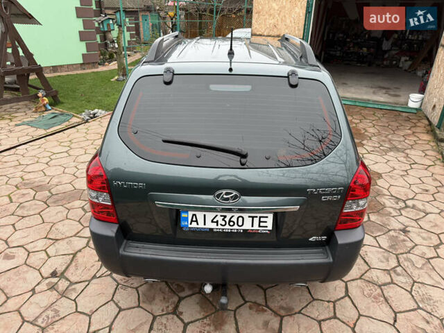 Зелений Хендай Туксон, об'ємом двигуна 2 л та пробігом 65 тис. км за 12250 $, фото 6 на Automoto.ua