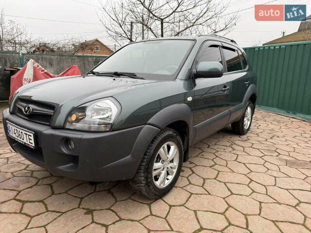 Зелений Хендай Туксон, об'ємом двигуна 2 л та пробігом 65 тис. км за 12250 $, фото 14 на Automoto.ua