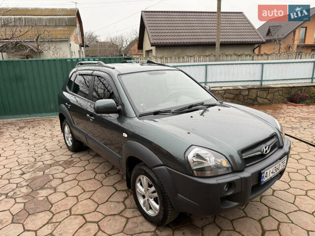 Зелений Хендай Туксон, об'ємом двигуна 2 л та пробігом 65 тис. км за 12250 $, фото 3 на Automoto.ua