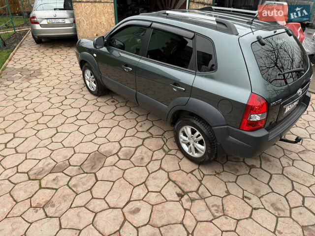 Зелений Хендай Туксон, об'ємом двигуна 2 л та пробігом 65 тис. км за 12250 $, фото 19 на Automoto.ua