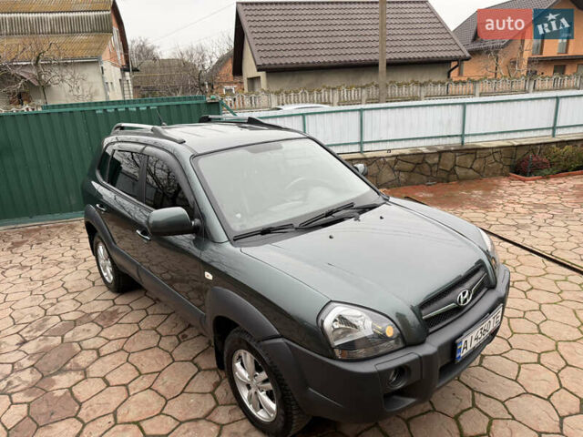 Зеленый Хендай Туксон, объемом двигателя 2 л и пробегом 65 тыс. км за 12250 $, фото 9 на Automoto.ua