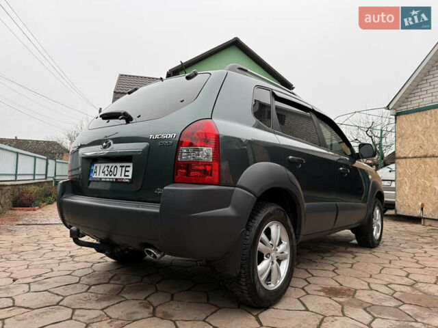 Зелений Хендай Туксон, об'ємом двигуна 2 л та пробігом 65 тис. км за 12250 $, фото 9 на Automoto.ua